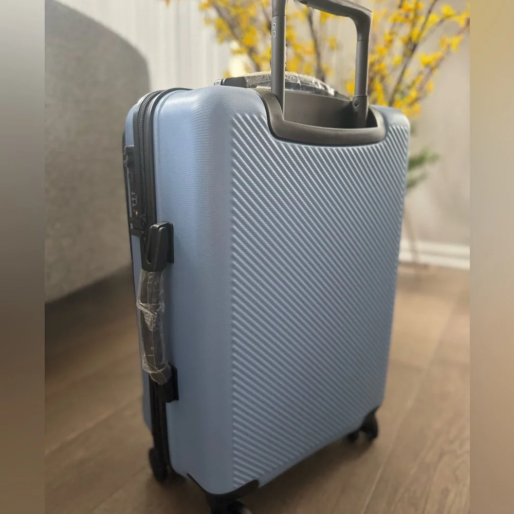 New! 🧳✈️🌎 CALPAK 22” Hardside Carry-on Spinner With Front Pocket in Amalfi Blu